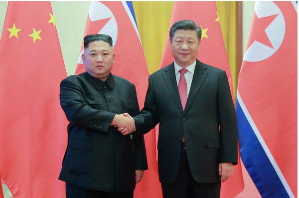 김정은 총비서와 시진핑 슬롯사이트 볼트 메이저 국가주석(사진=조선의 오늘)